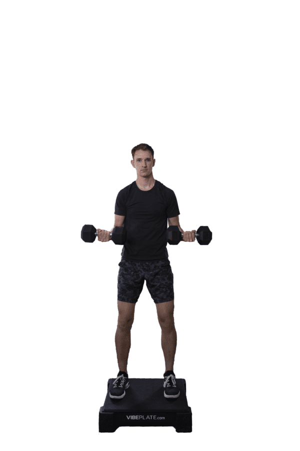 Man performing dumbbell exercises on a VibePlate 2424