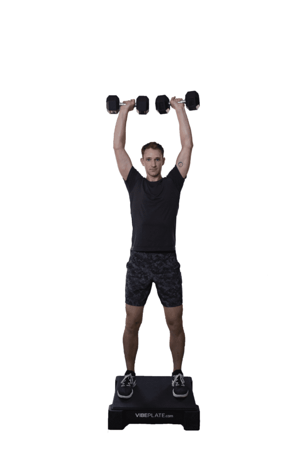 Man performing dumbbell exercises on a VibePlate 2424