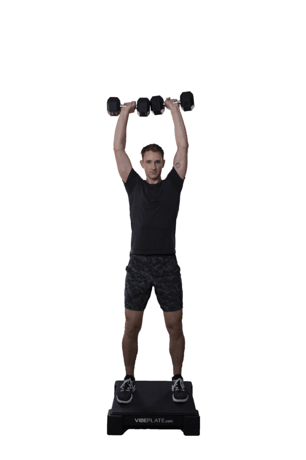 Man performing dumbbell exercises on a VibePlate 2424