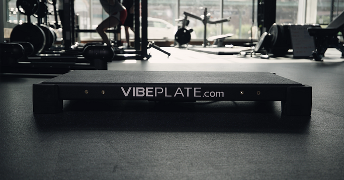 VibePlate machine in a modern gym, symbolizing the brand's evolution and commitment to excellence